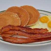 Chef'S Special Cakes · 3 pancakes, 2 eggs, with choice of 4 bacon, 2 sausages, or 1 slice of ham..