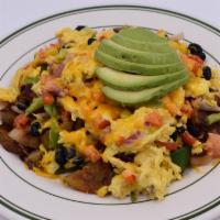 Vegetable Skillet · Sauteed mushrooms, tomato, red onion and red bell pepper scrambled with two eggs, topped wit...