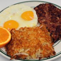 Cornbeef Hash/Eggs · Homestyle corned beef hash, grilled and served with 2 eggs, hash browns or home fries, and c...