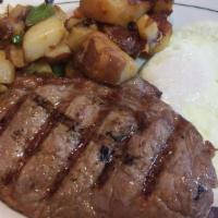 Top Steak & Eggs · USDA choice (8 oz) steak cooked to your liking and served with 2 eggs, hash browns or home f...
