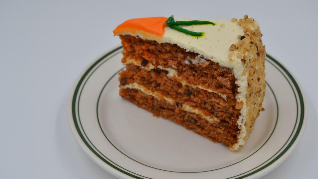 Carrot Cake · A generous slice of our triple layer carrot cake.