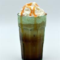 Iced Caramel Coffee · 16oz. Made with our double brew, caramel and crowned with whipped cream.