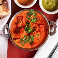 Chicken Tikka Masala (Ala Carte) · White breast marinated chicken baked in clay oven with thick spiced gravy. Ala carte served ...
