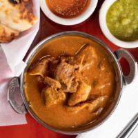 Goat Curry (Ala Carte) · Pieces of goat cooked in finely ground fresh masala.