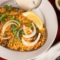 Chicken Biryani (Thali) · Basmati rice and chicken flavored with saffron, cooked with Indian herbs on low heat. Thali ...