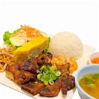 House Special Combo · Marinated char grilled pork chop, chicken, shrimps, shredded pork and Vietnamese style steam...