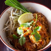 Sidewalk Pad Thai · Spicy. Thin rice noodles with chives, egg, bean sprouts, and sweet radish. Served with dried...