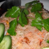 Khao Pad Pu - Crab Fried Rice · Snow crab, egg, green onion, garlic, chili fish sauce and lime.