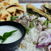 Spanakopita Plate · Spinach, onions, feta and cottage cheese baked in filo dough, served with pita and tzatziki ...