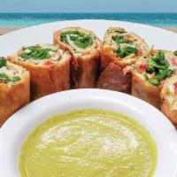 Crispy Baja Roll  · Chopped chicken breast, cream cheese, spinach & salsa hand-rolled in a flour tortilla. serve...