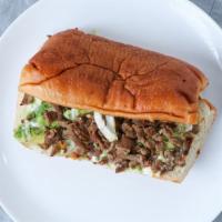 Torta Regular · Your choice of meat, melted cheese, sour cream, avocado, onions, lettuce and tomatoes. Torta...