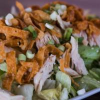 Chinese Chicken Salad · Lettuce, shredded chicken, crispy wonton strips, toasted almonds, sesame seeds, and green on...