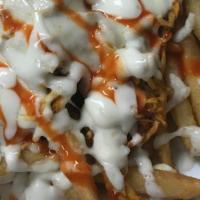 Buffalo Chicken Fries · Fries with chicken breast tossed with buffalo sauce, melted cheese and drizzled with blue ch...