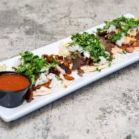 Street Tacos · Three small tortillas. your choice of meat.