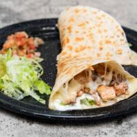 Super Quesadilla Meat · Size ten flour tortilla, meat, melted cheese, guacamole, sour cream, lettuce, and salsa.