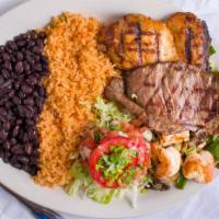 Carne Asada, Grilled Chicken, & Garlic Prawns · Combination plate served with rice beans and tortillas.