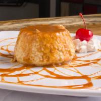 Flan De Elote · Mexican old fashion custard with our added twist of corn.