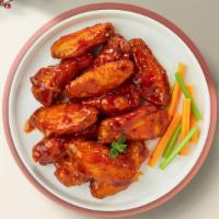 Ride The Buffalo Wings  · Fresh chicken wings breaded, fried until golden brown, and tossed in buffalo sauce. Served w...