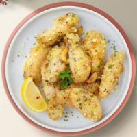It'S A Parm Life Wings  · Fresh chicken wings breaded, fried until golden brown, and tossed in garlic and parmesan. Se...