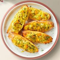 Get Cheesy Bread · (Vegetarian) Housemade bread toasted and garnished with butter, garlic, mozzarella cheese, a...