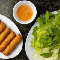 Chảgiò / Egg Rolls (6) · Pork, chicken, shrimp, taro, & carrot fried in a dough wrap. Served
with lettuce, mint, and ...
