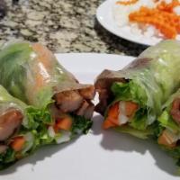 Thit Nuong Cuon (2 Cuon) / Char-Grilled Pork Rolls (2 Rolls) · Grilled pork tenderloin with vermicelli noodles, bean sprouts,
& lettuce wrapped in rice pap...