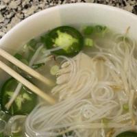 Pho Ga / Chicken Pho · Rice noodles & chicken broth with thin cuts of chicken breast. served with onion, green onio...