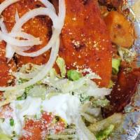 Enchiladas Cheese ,Chicken Or Beef · Red or green sauce ,rice,beans,fresh cheese,sour cream,onions,cilantro,lettuce