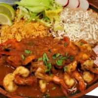 Camarones Rancheros · Rice,beans,shrimp,ranchero sauce,onions,bell peppers