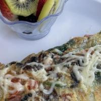 Veggie Omelette · Favorite. Spinach, mushroom, onion & Swiss cheese. Made with organic eggs.