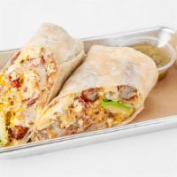Combo Breakfast Burrito · Eggs, bacon, sausage, roasted potatoes, cheddar cheese, grilled bell pepper and grilled onio...