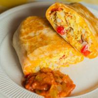 Combo Breakfast Burrito · Scrambled eggs, bacon, sausage, grilled bell peppers, grilled onions, home fries, and Chedda...