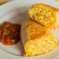 Classic Breakfast Burrito · Scrambled eggs, home fries, and cheddar cheese wrapped in a flour tortilla. Served with a si...