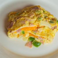 Western Omelet · 3 eggs, Ham, Peppers, Onions and cheddar cheese.