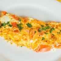The Greek Omelet · 3 eggs, Tomatoes, Feta and Onions.