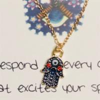 Hamsa Evil Eye Necklace · Hamsa Evil Eye Necklace is for evil eye protection. Protect yourself in style.