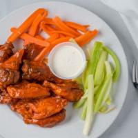 Kaminski'S Spiced Wings  · Crisp, tender chicken wings tossed with spicy buffalo or BBQ sauce. Served with carrot and c...