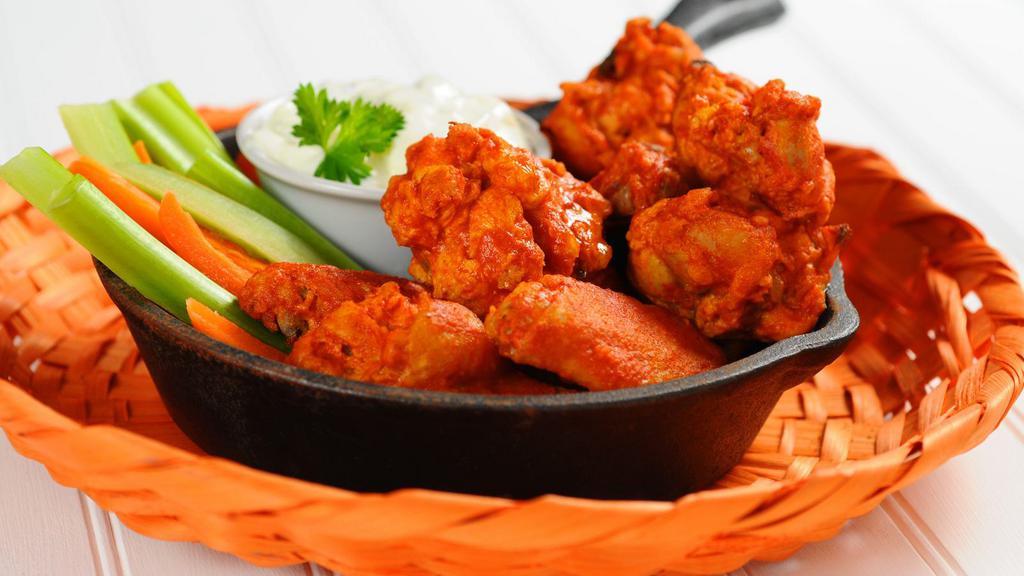Bbq Chicken Wings · Crispy chicken wings tossed in BBQ sauce.
