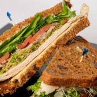 Turkey Sandwich · On Raisin Walnut Bread with Mayonnaise, Lettuce, Tomato, Red Onion, Sprouts, Vinaigrette, Tu...