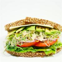 Vegetarian Sandwich · On Raisin Walnut Bread with Mayonnaise, Lettuce, Tomato, Red Onion, Sprouts, Vinaigrette, Su...