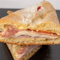 Monte Carlo · On grilled Provencal with Dijon mayo spread, tomatoes, onions, turkey, ham, salami, red onio...