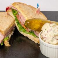 Whole Sandwich With Salad Or Soup · Choice of chicken salad, turkey, ham, tuna, vegetarian or egg salad with choice of tossed gr...