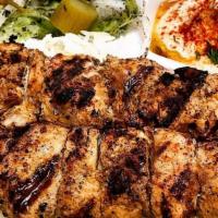 Chicken Kabob Plate · Marinated chicken, rice, hummus, salad, pickles and pita.
