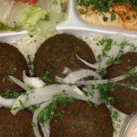 Falafel Plate · 5 falafel pieces with rice, hummus, salad, pickles and pita.