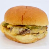 Cheeseburger · Hand formed and flat top grilled with onions. All come served with American cheese, pickles,...