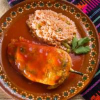 Cheese Chile Relleno · Green chile pepper, stuffed with cheese, lightly battered and fried and smothered in our hom...