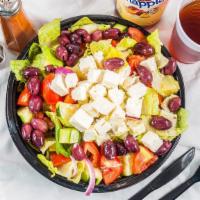 Greek Salad · Vegetarian. Crisp romaine lettuce, cucumbers, onion, olives, tomatoes, and feta cheese with ...