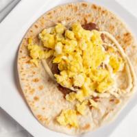 Scrambled Eggs · Original Baleada with toppings
Scrambled Eggs / Huevo