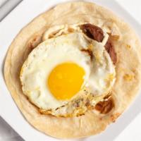 Sunnyside Egg · Original Baleada with toppings
Sunnyside Egg / Huevo estrellado