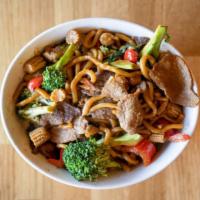 Stir Crazy · sautéed house-made noodles, thinly sliced beef and pork, bell pepper, baby corn, broccoli, a...